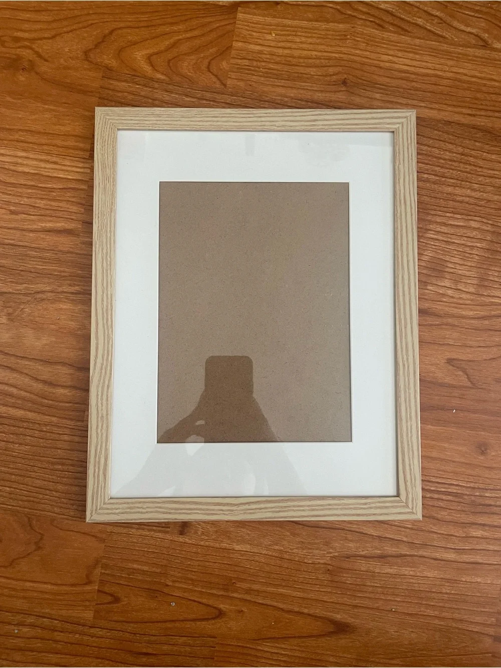 8.5x11 Light wood picture frame with white matting